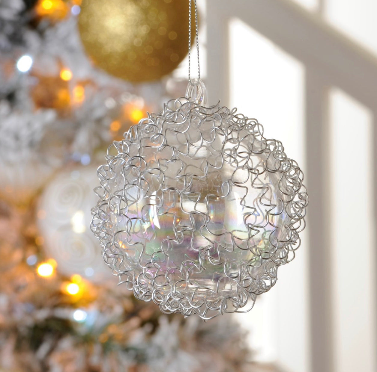 9cm iridescent glass ball with metal wire detail Ornament