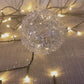 9cm iridescent glass ball with metal wire detail Ornament